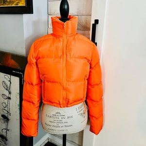 Orange cropped puffer jacket